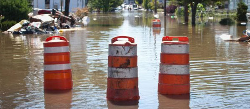 Emergency traffic cones in flooded water